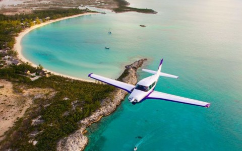 a plane flying over water