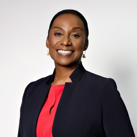 a woman in a black jacket