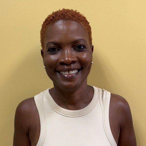 a woman smiling at the camera