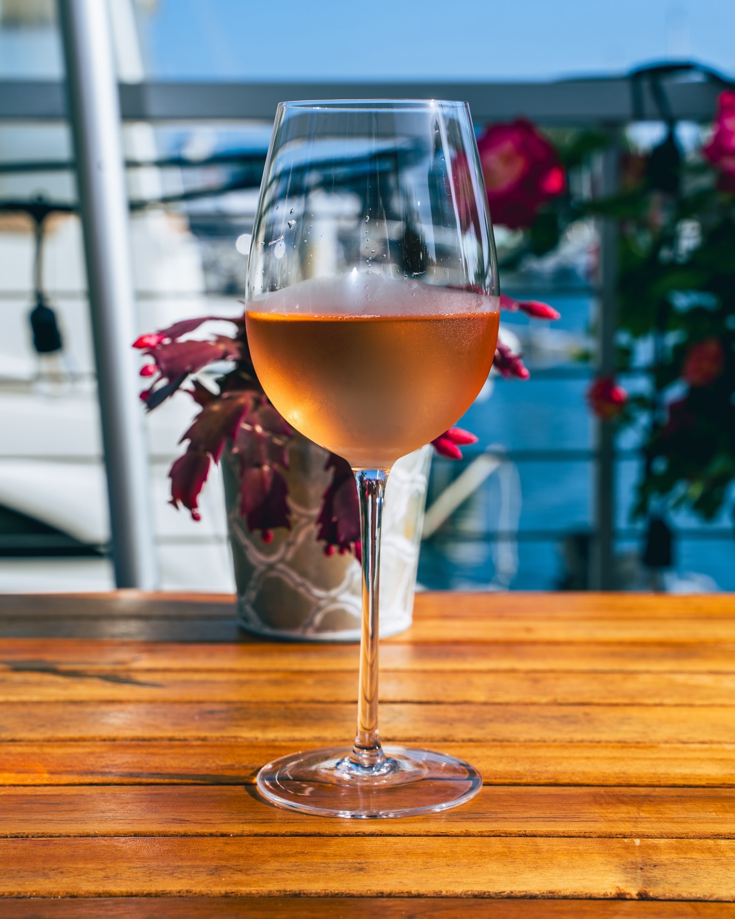 a glass of wine on a table