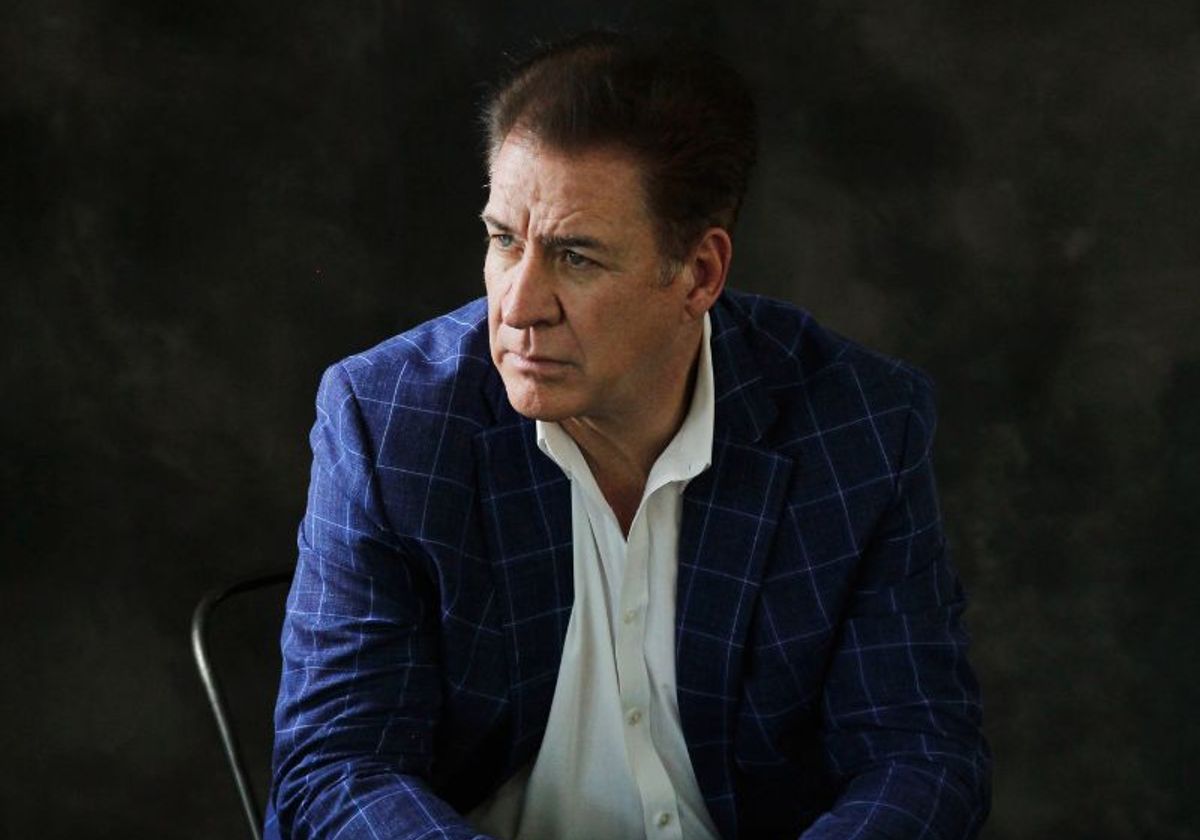 a man in a blue suit