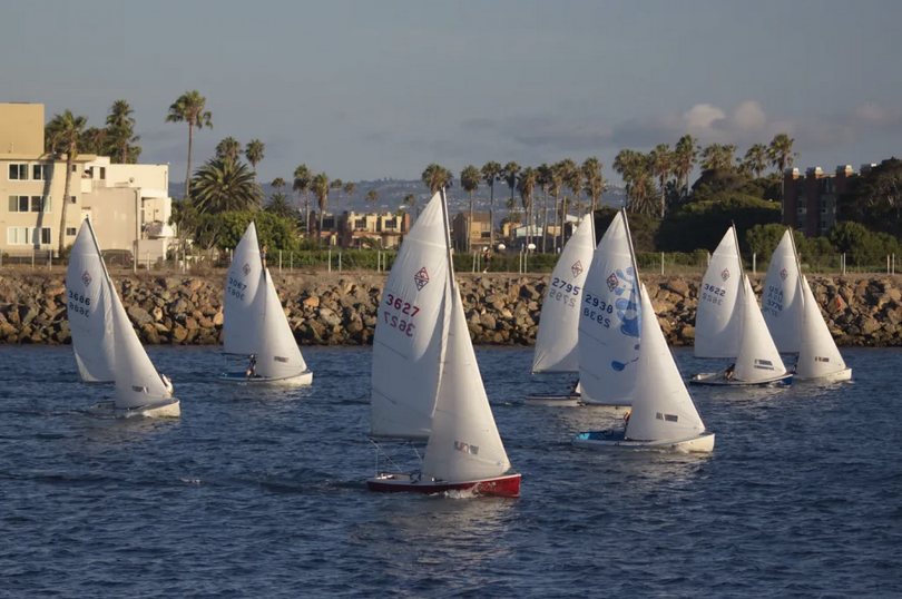a group of sailboats on water