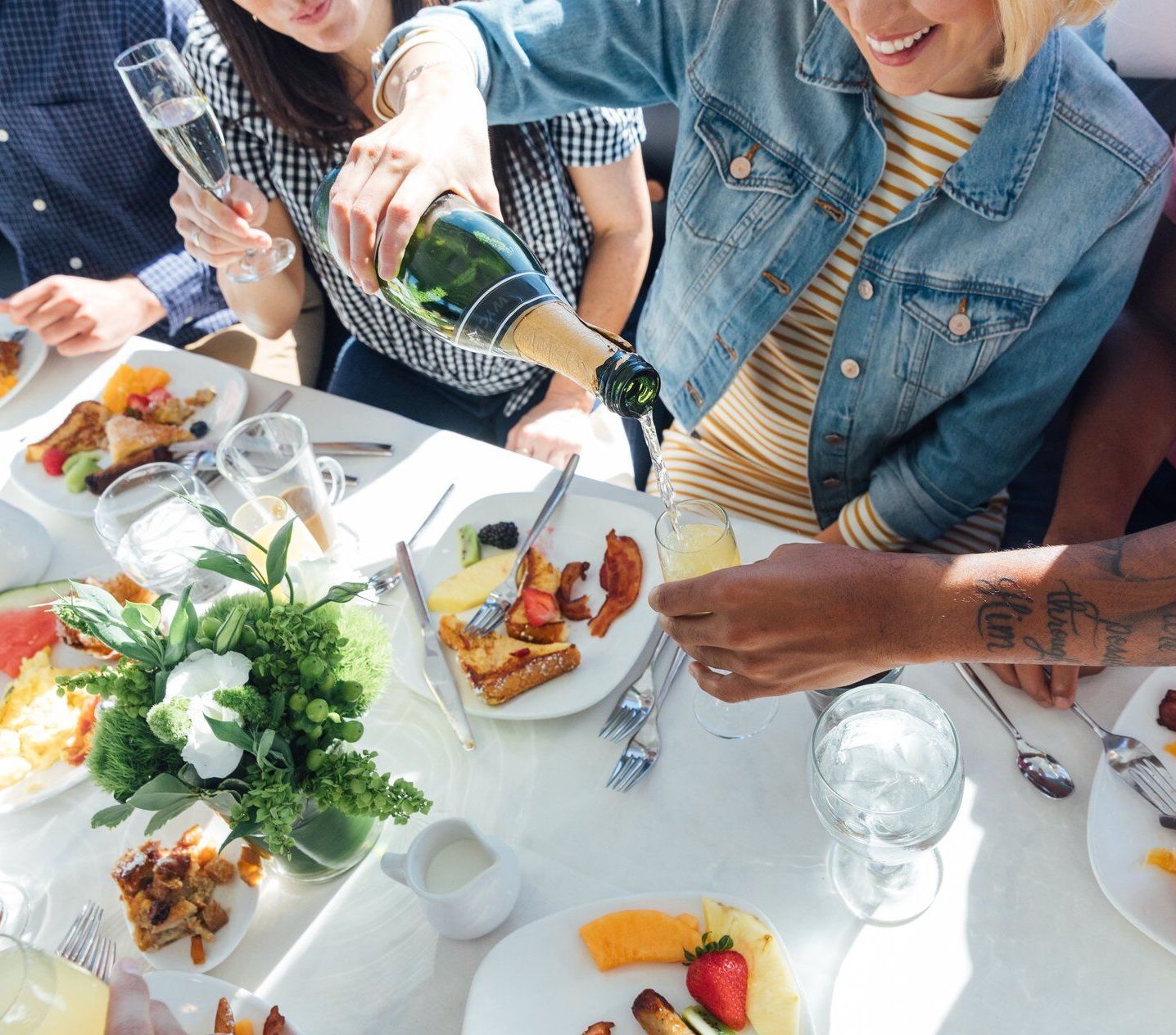 a group of people sitting around a table