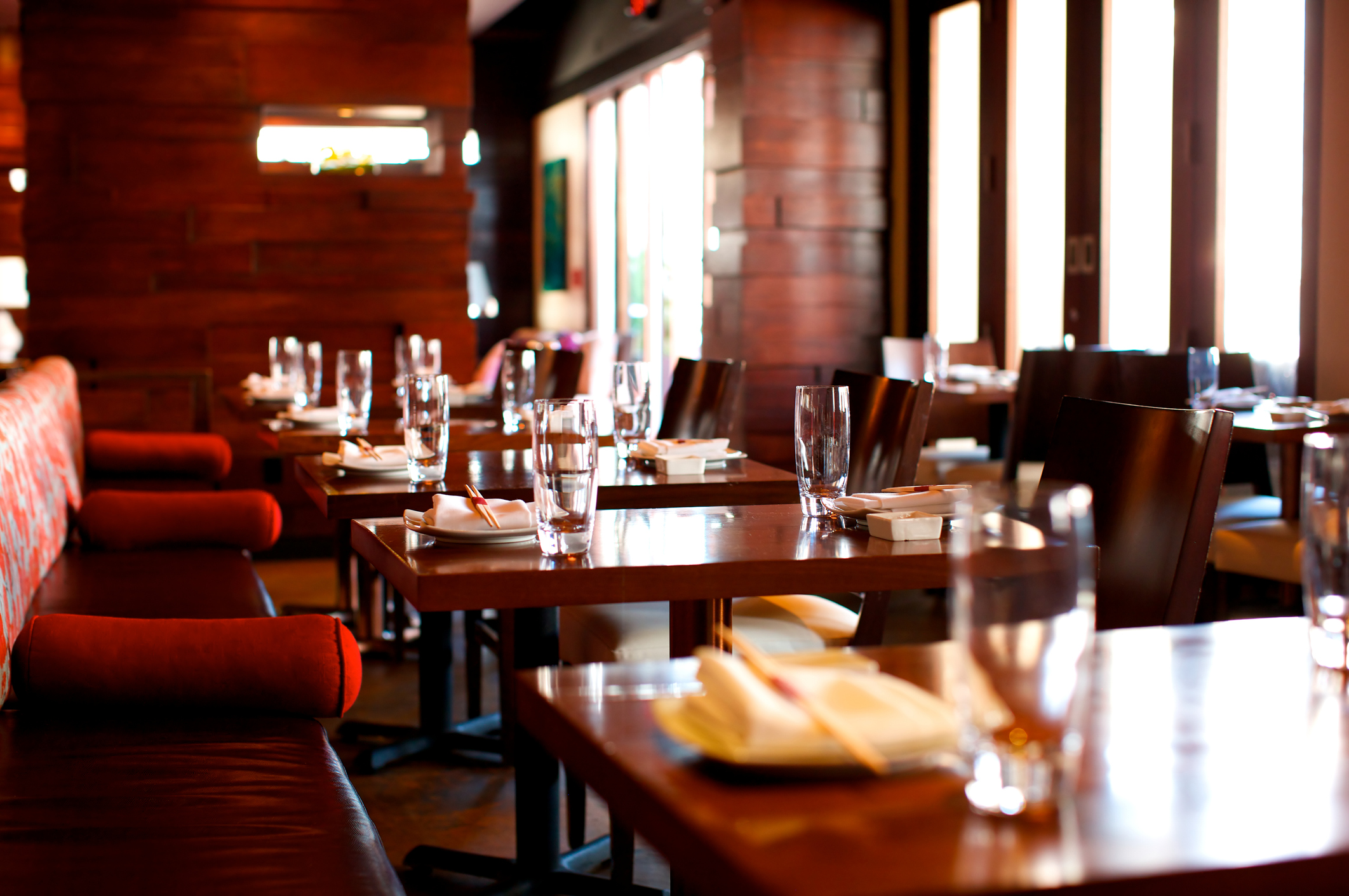 a restaurant with tables and chairs