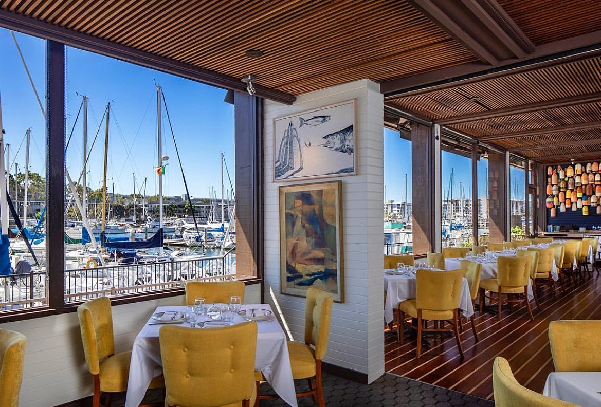 a restaurant with tables and chairs
