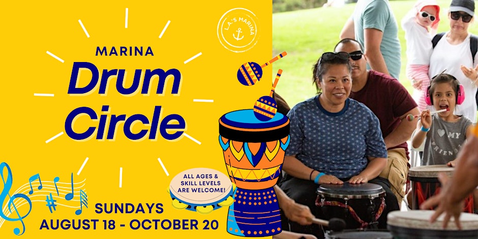 a group of people sitting on a drum
