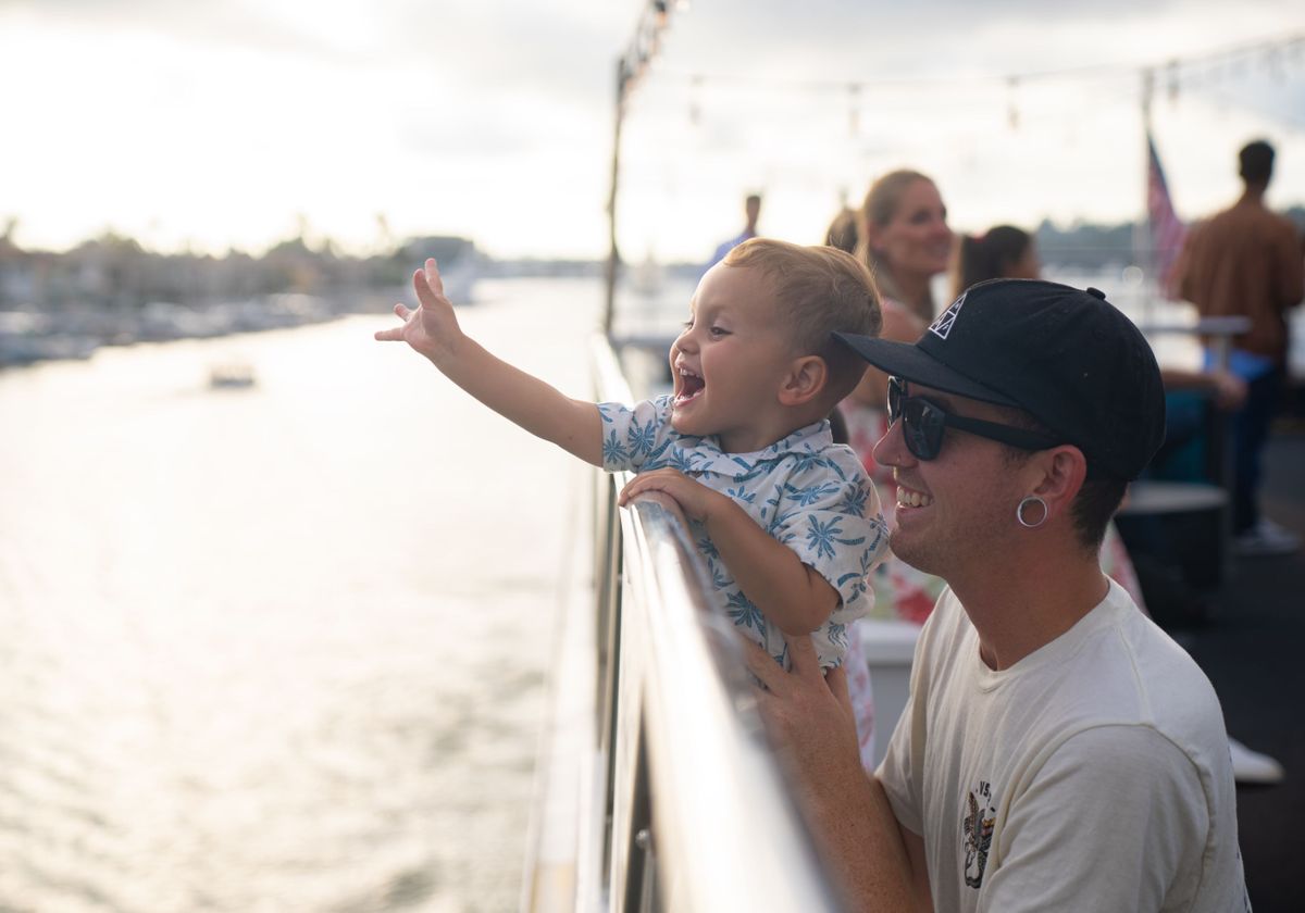 a man and child on a boat