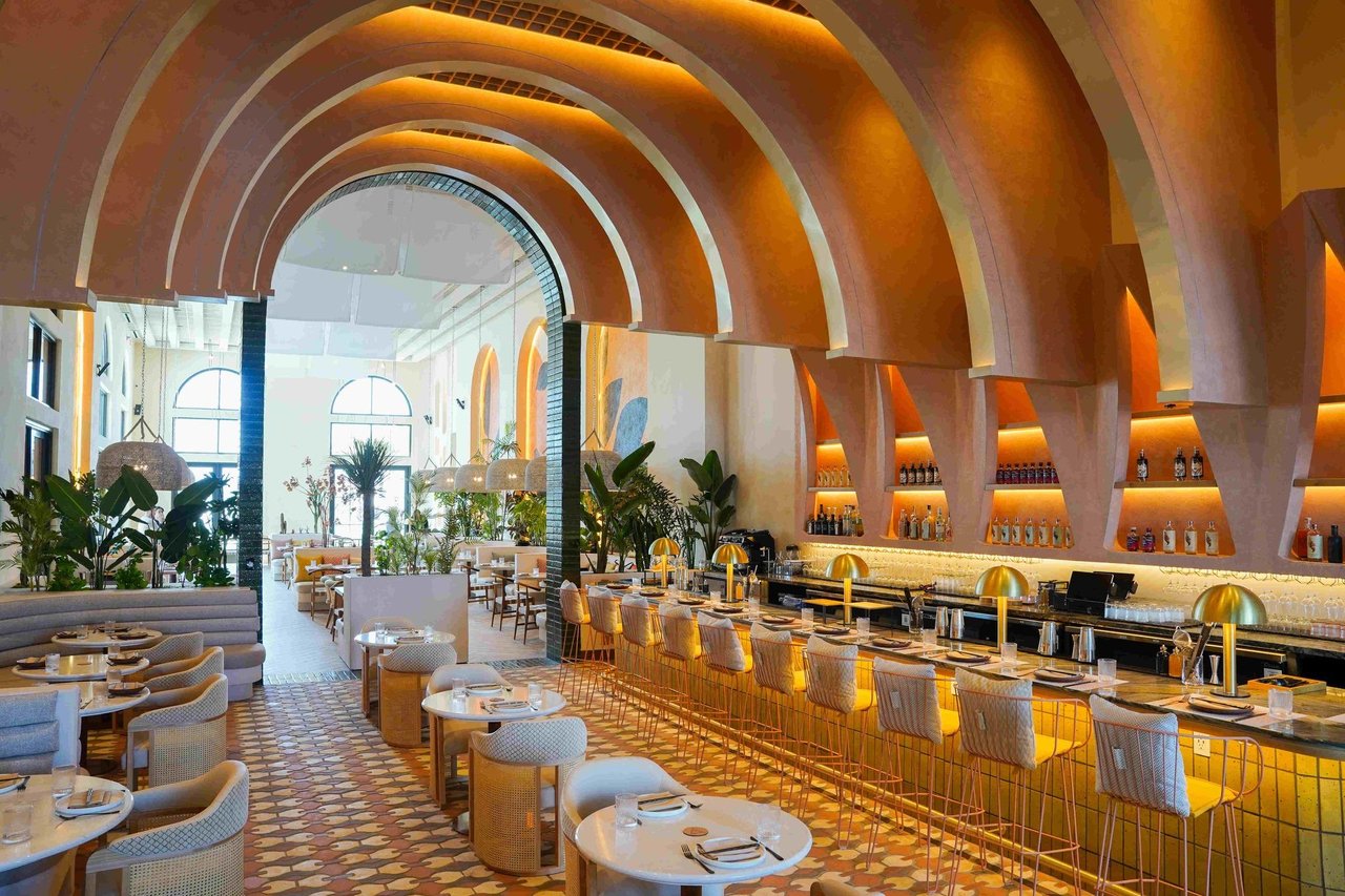 a restaurant with tables and chairs