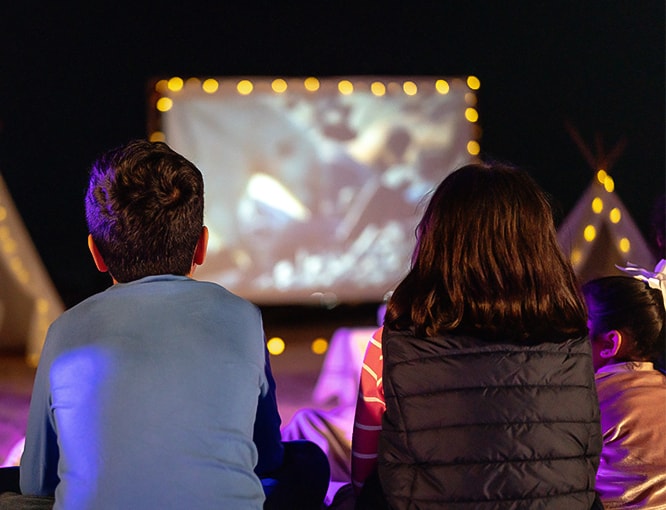 a group of people watching a movie