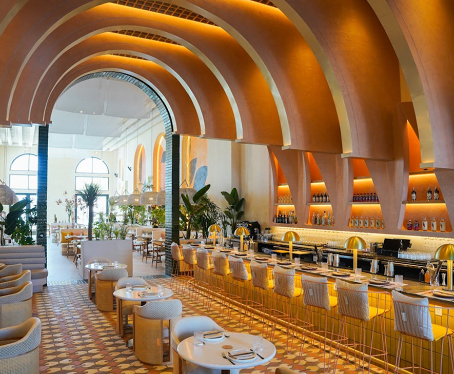 a restaurant with tables and chairs