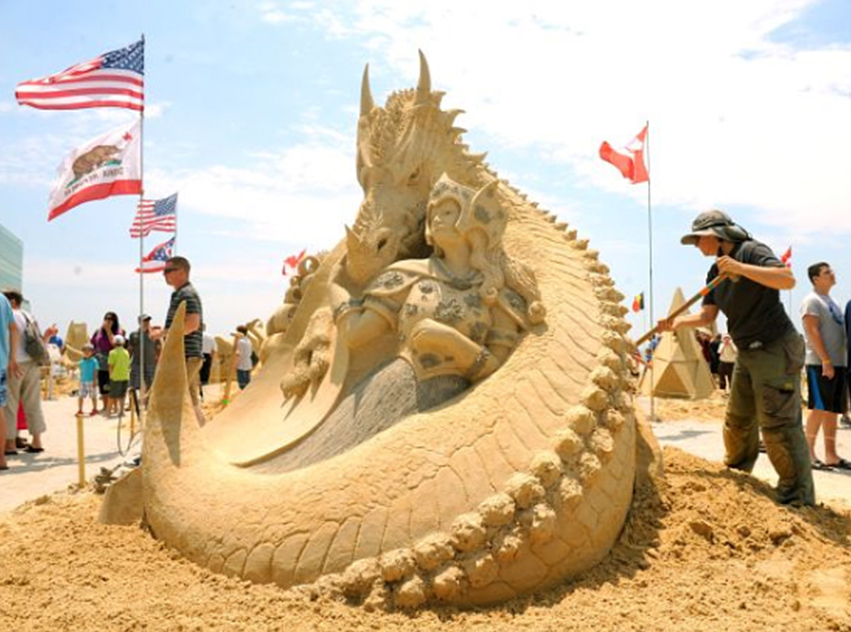 a sand sculpture of a dragon