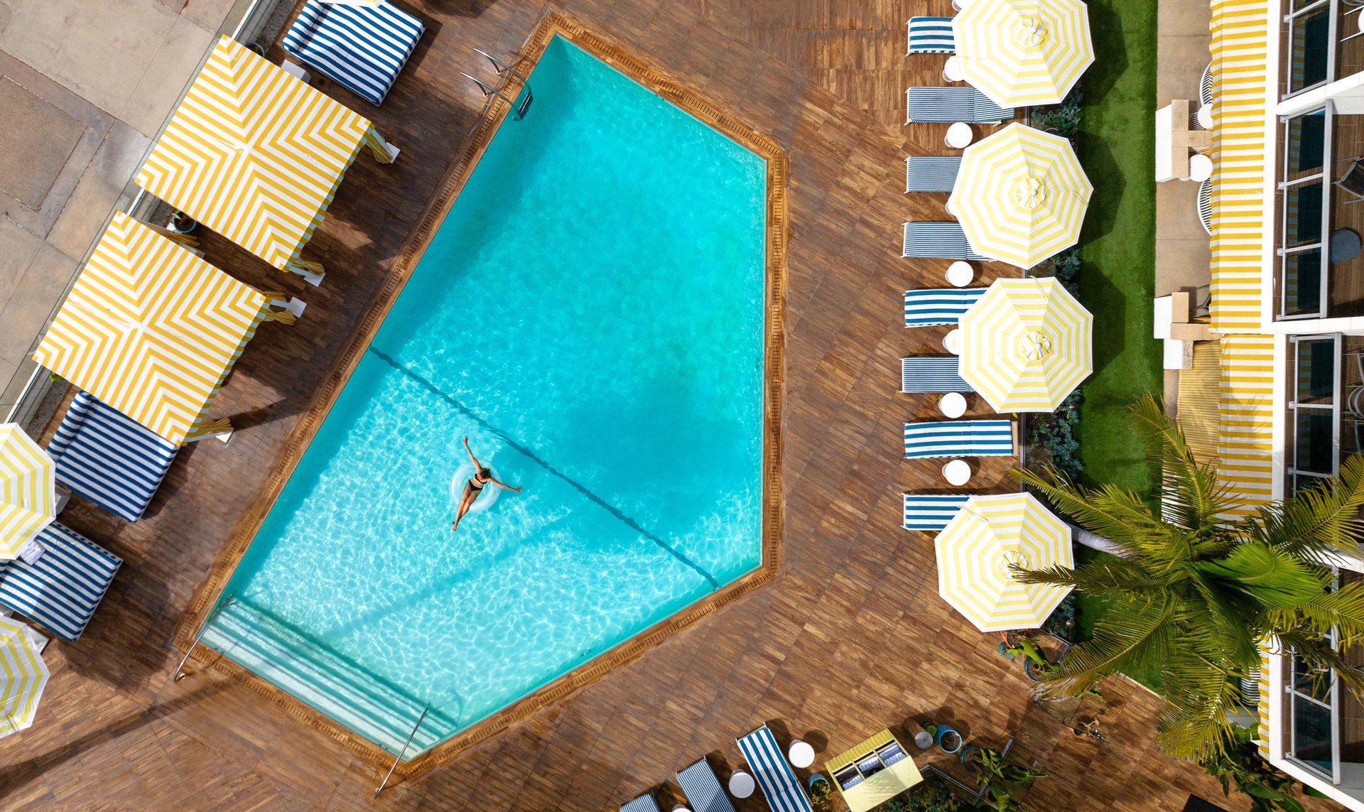 a person floating on a pool