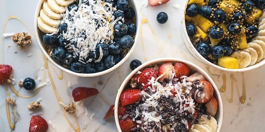 a group of bowls of fruit