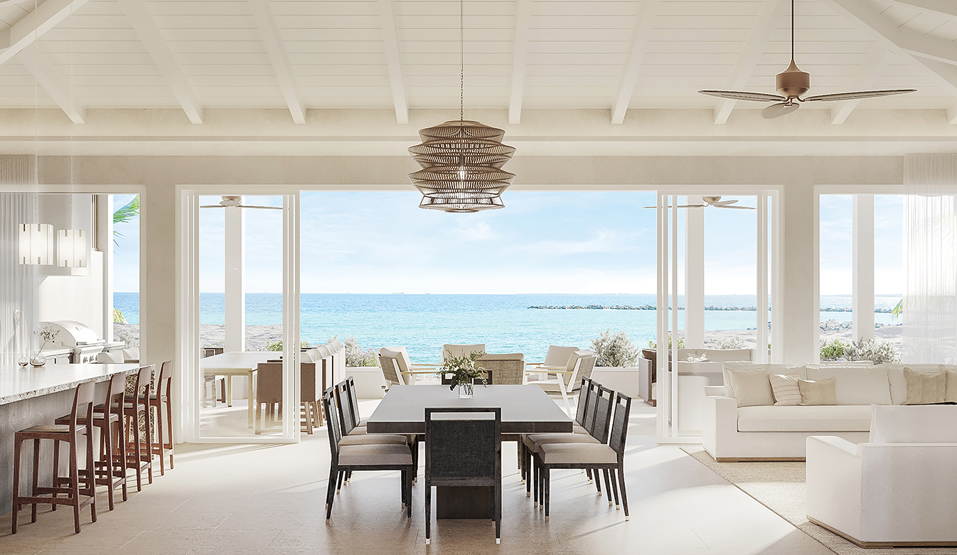 a dining table with chairs in a room with a view of the ocean