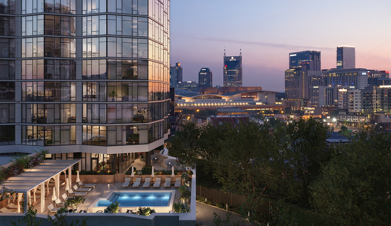 a building with a pool and trees in front of it