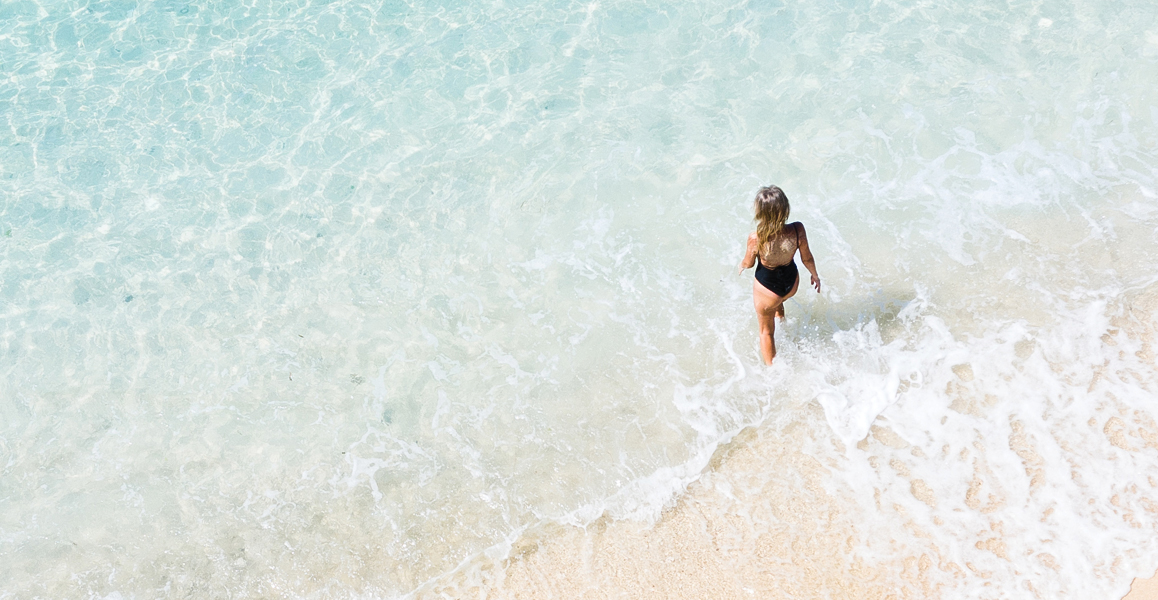 a woman standing in the water