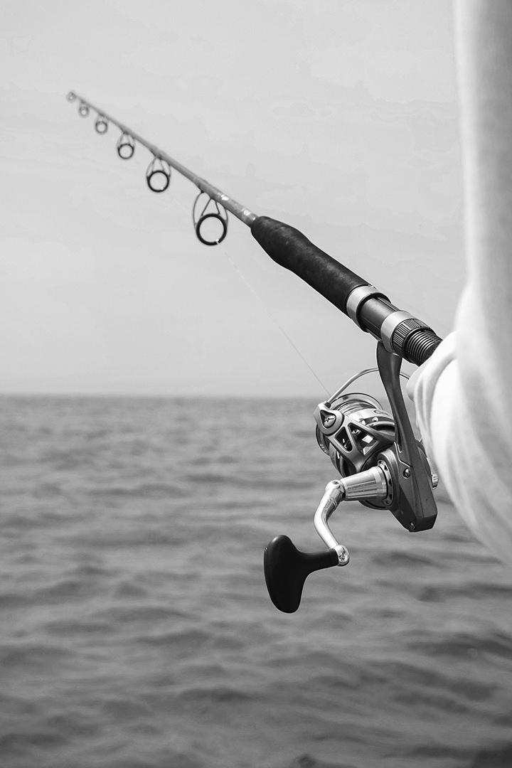 a fishing pole with a fishing rod in the water