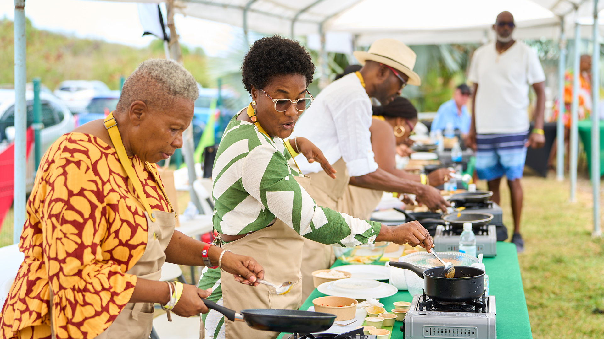 a group of people cooking food