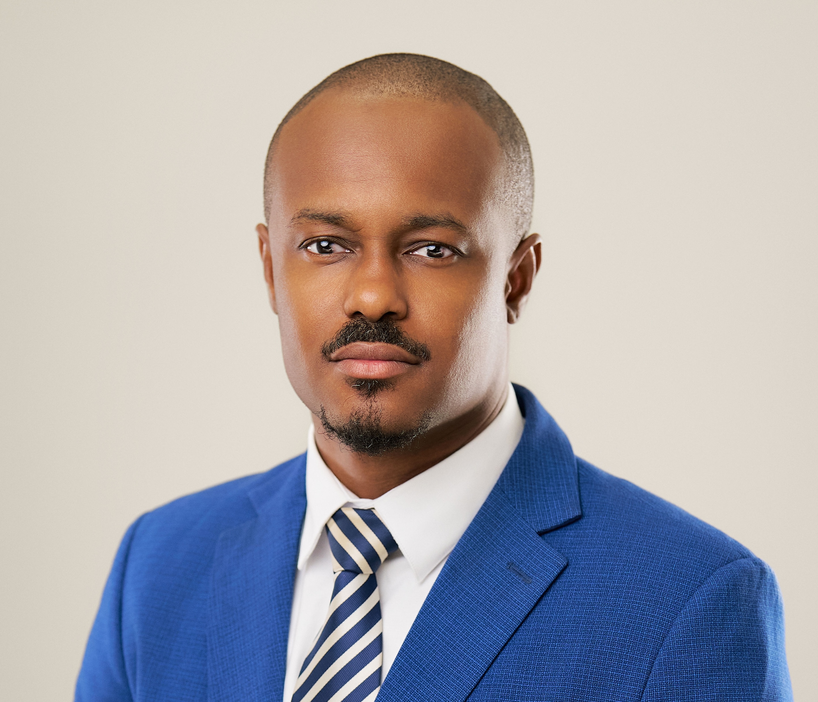 a man in a blue suit