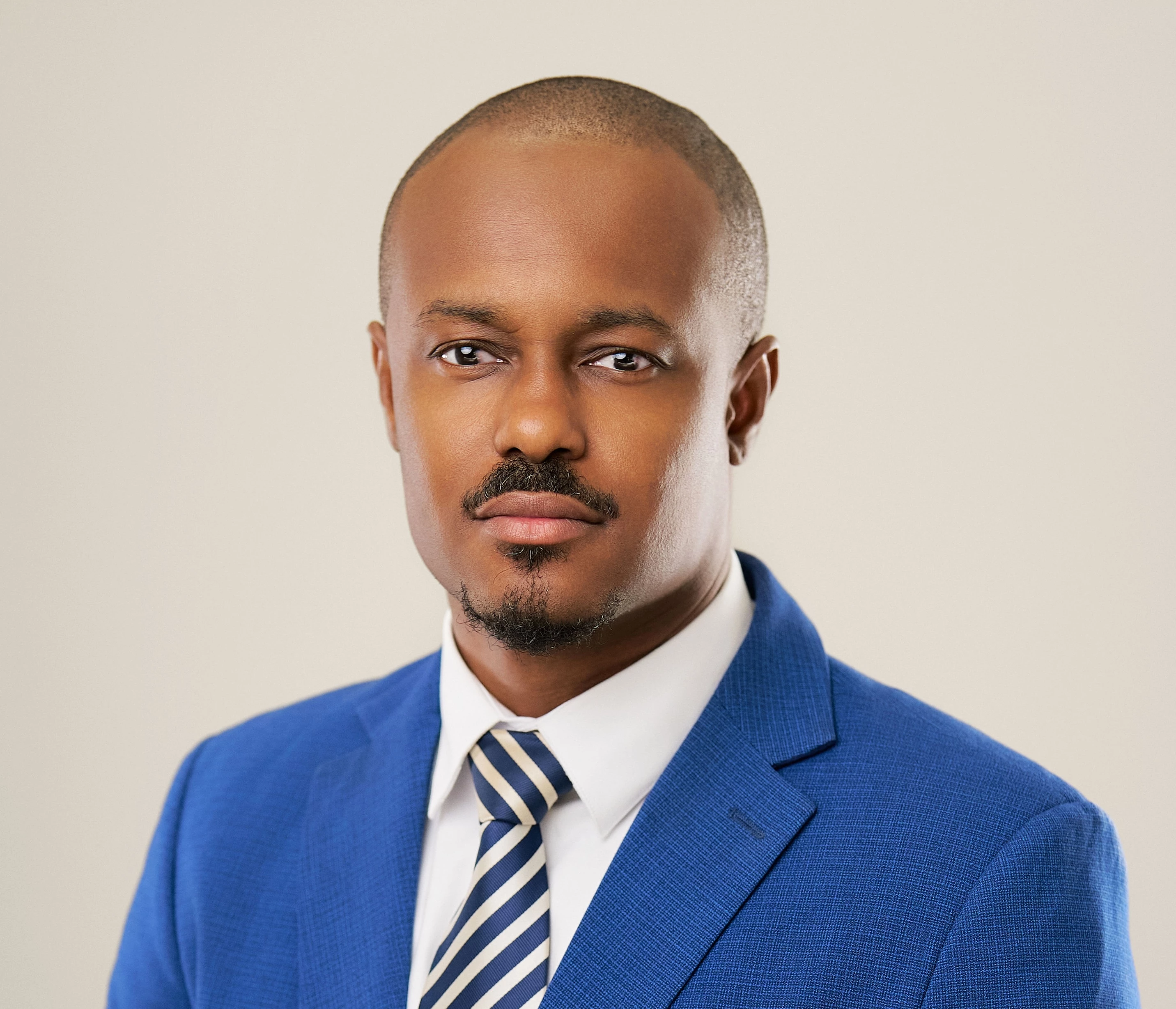 a man in a blue suit