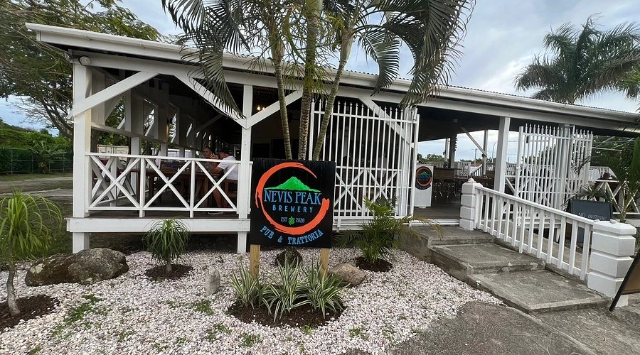 a sign in front of a building