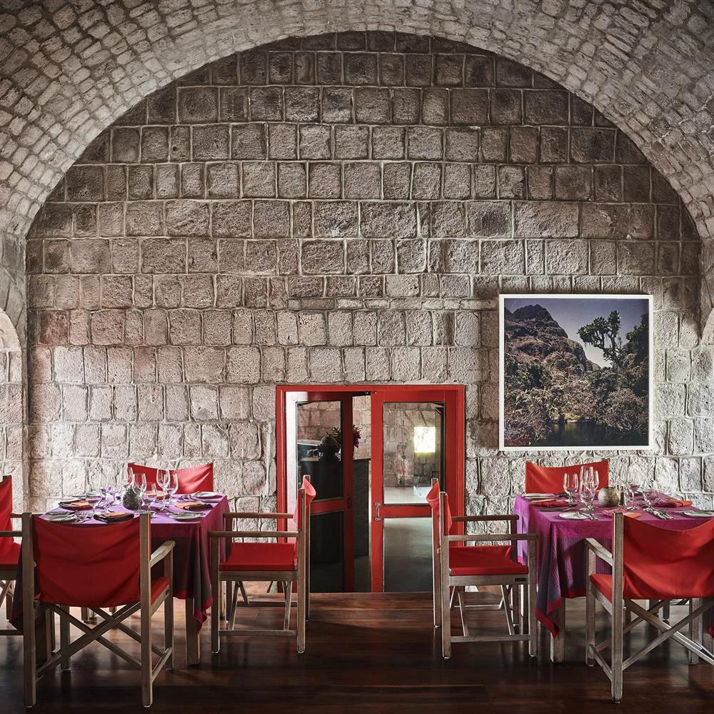 a room with tables and chairs