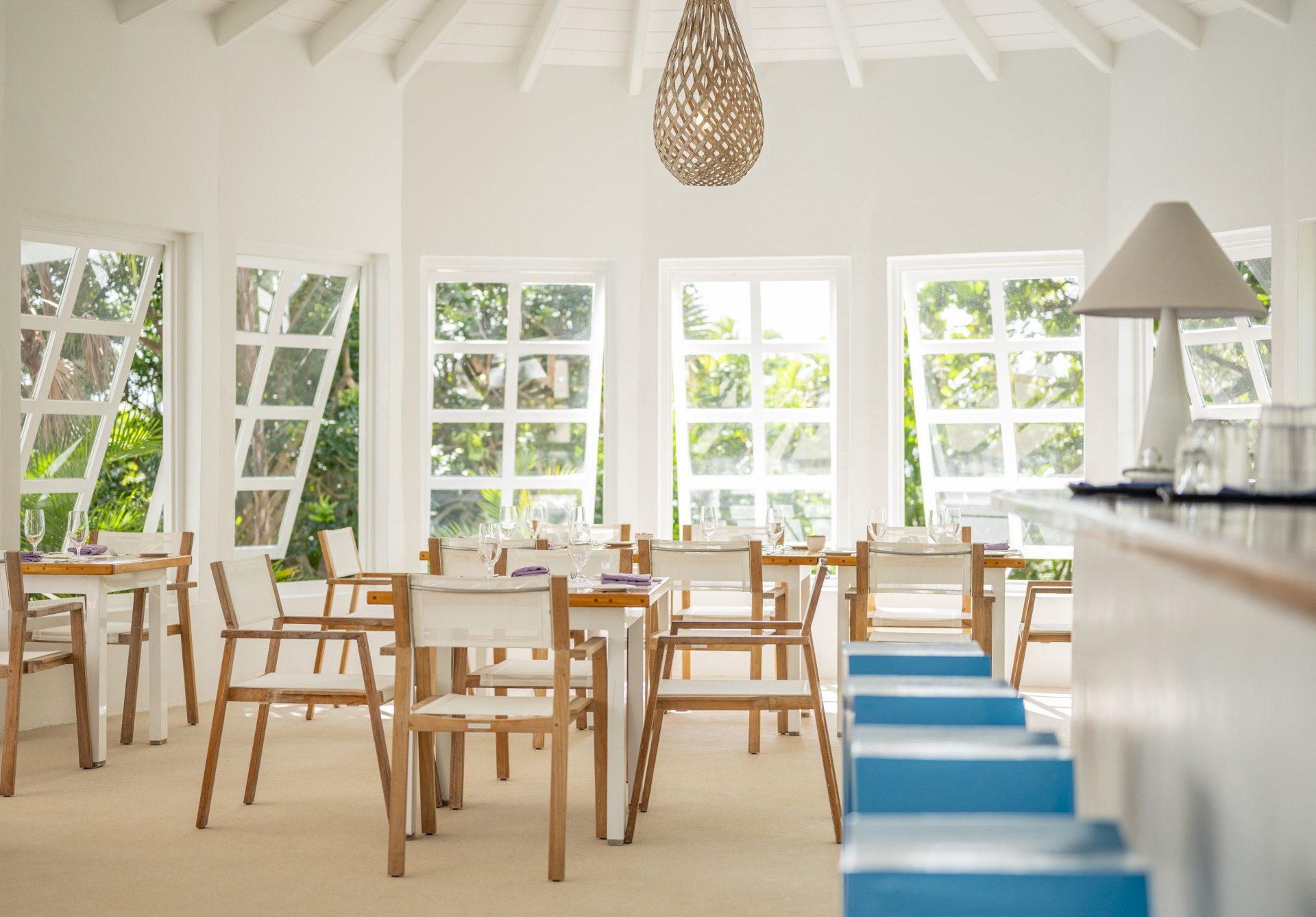 a room with tables and chairs