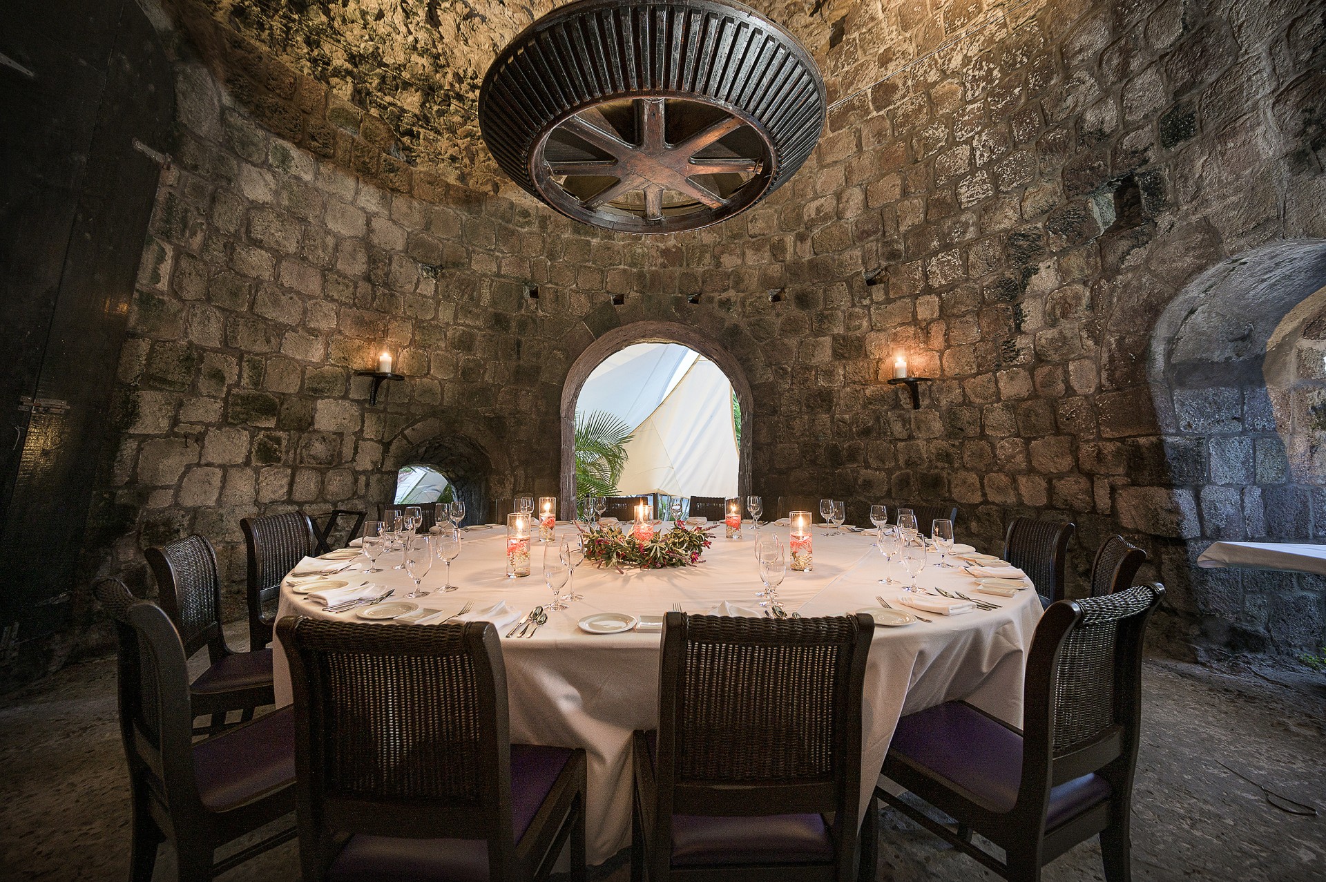 a round table with candles on it