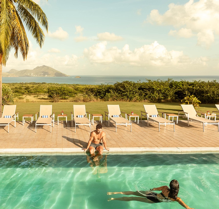 a man and woman in a pool