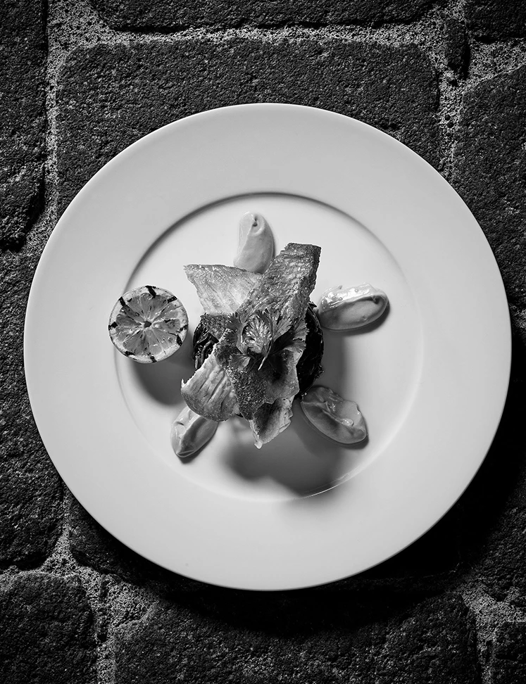 a plate of food on a stone surface