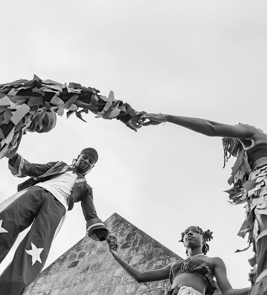 a group of people holding hands
