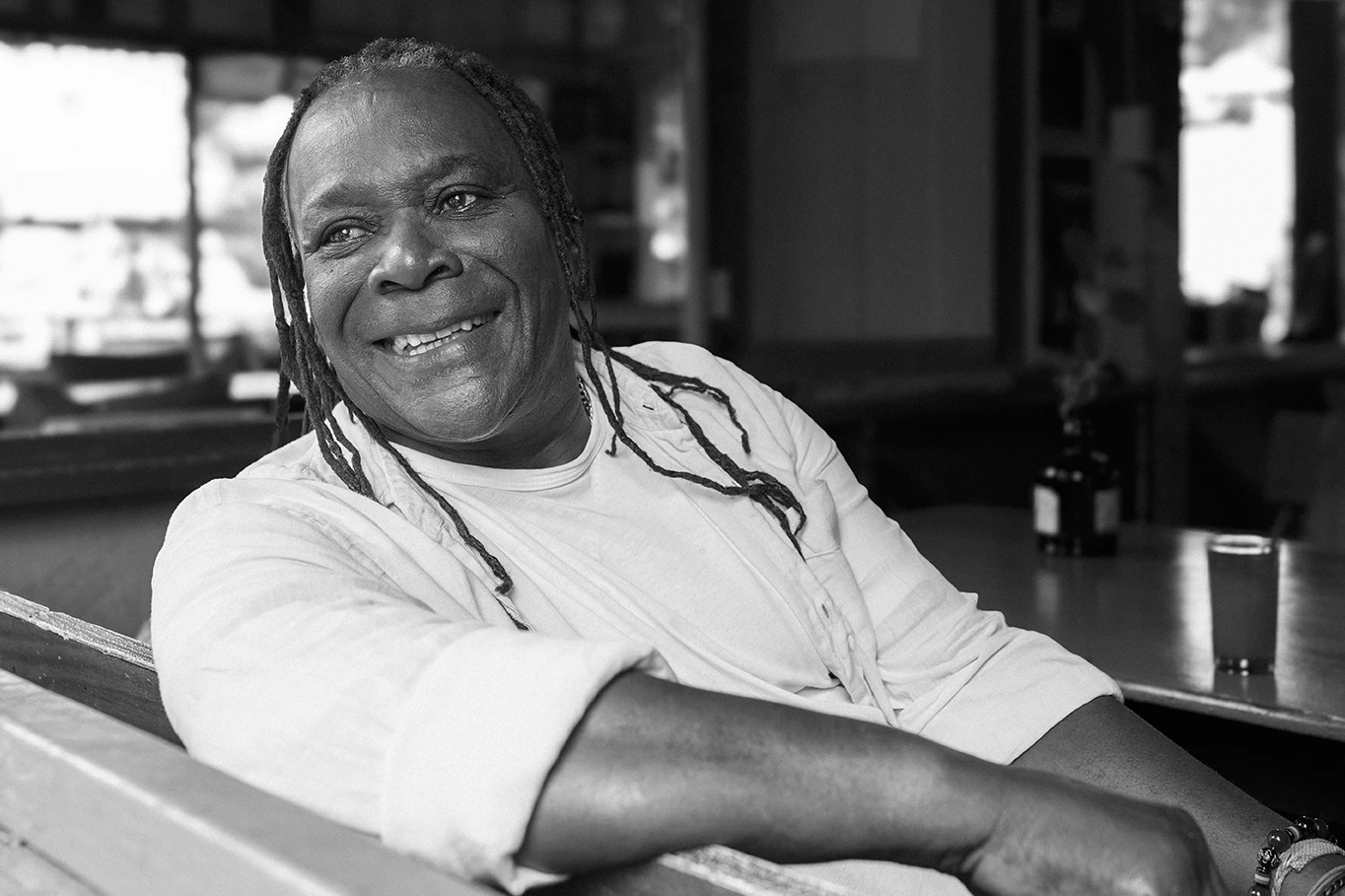 a man smiling at the camera