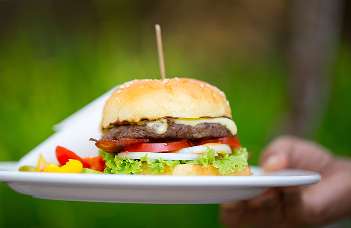 a plate of food on a hand