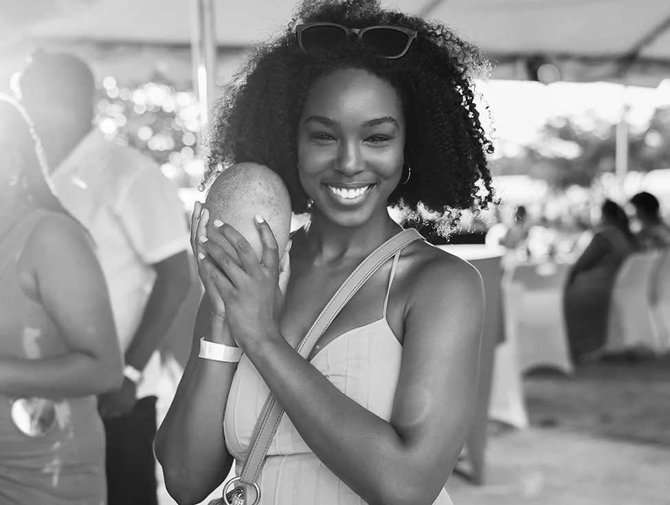 a woman holding a potato