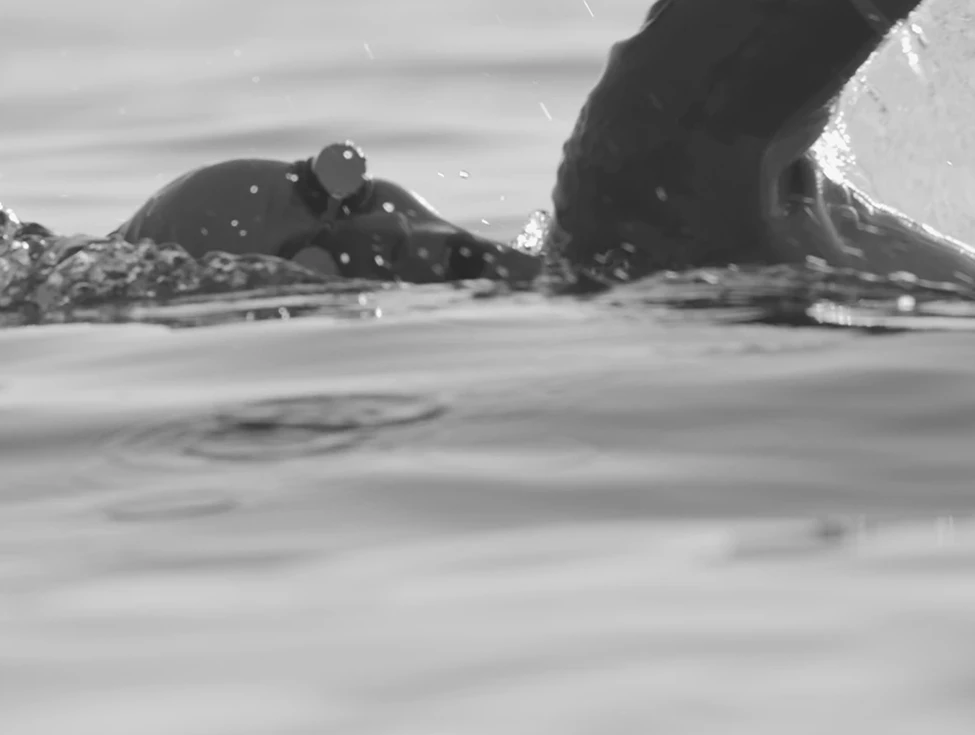 a person swimming in the water