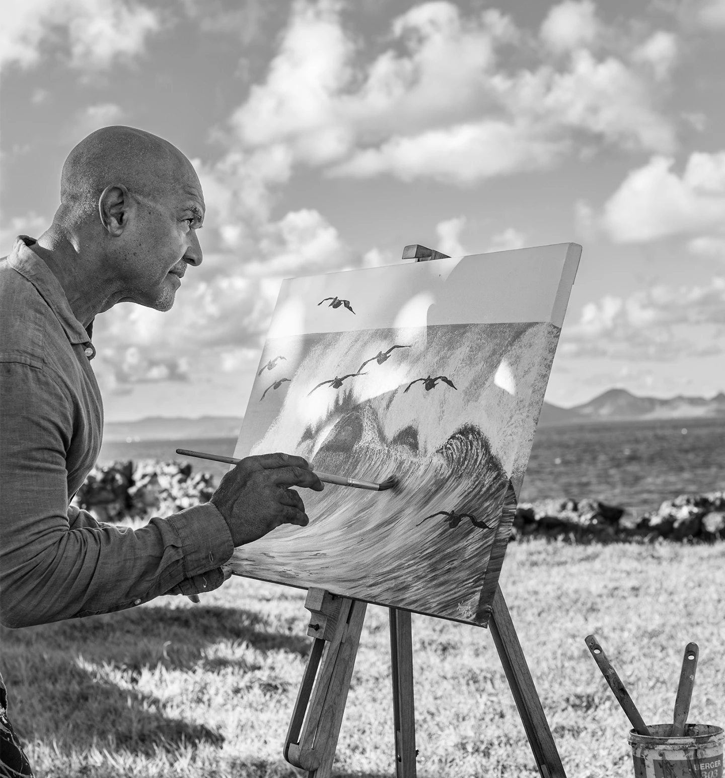 a man painting a picture
