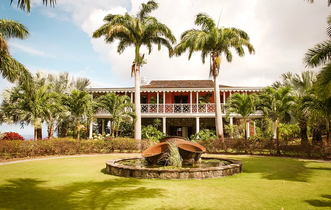 a fountain in front of a house