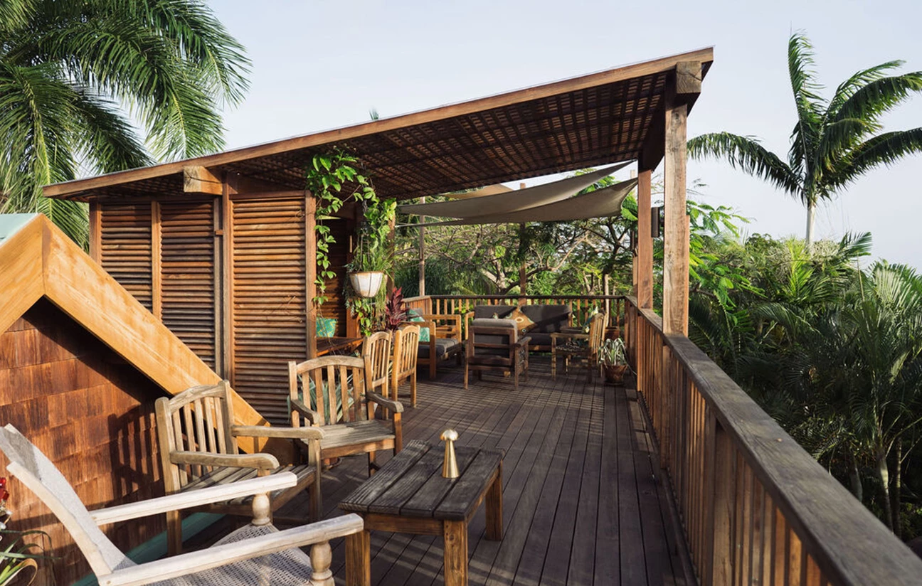 a deck with chairs and tables