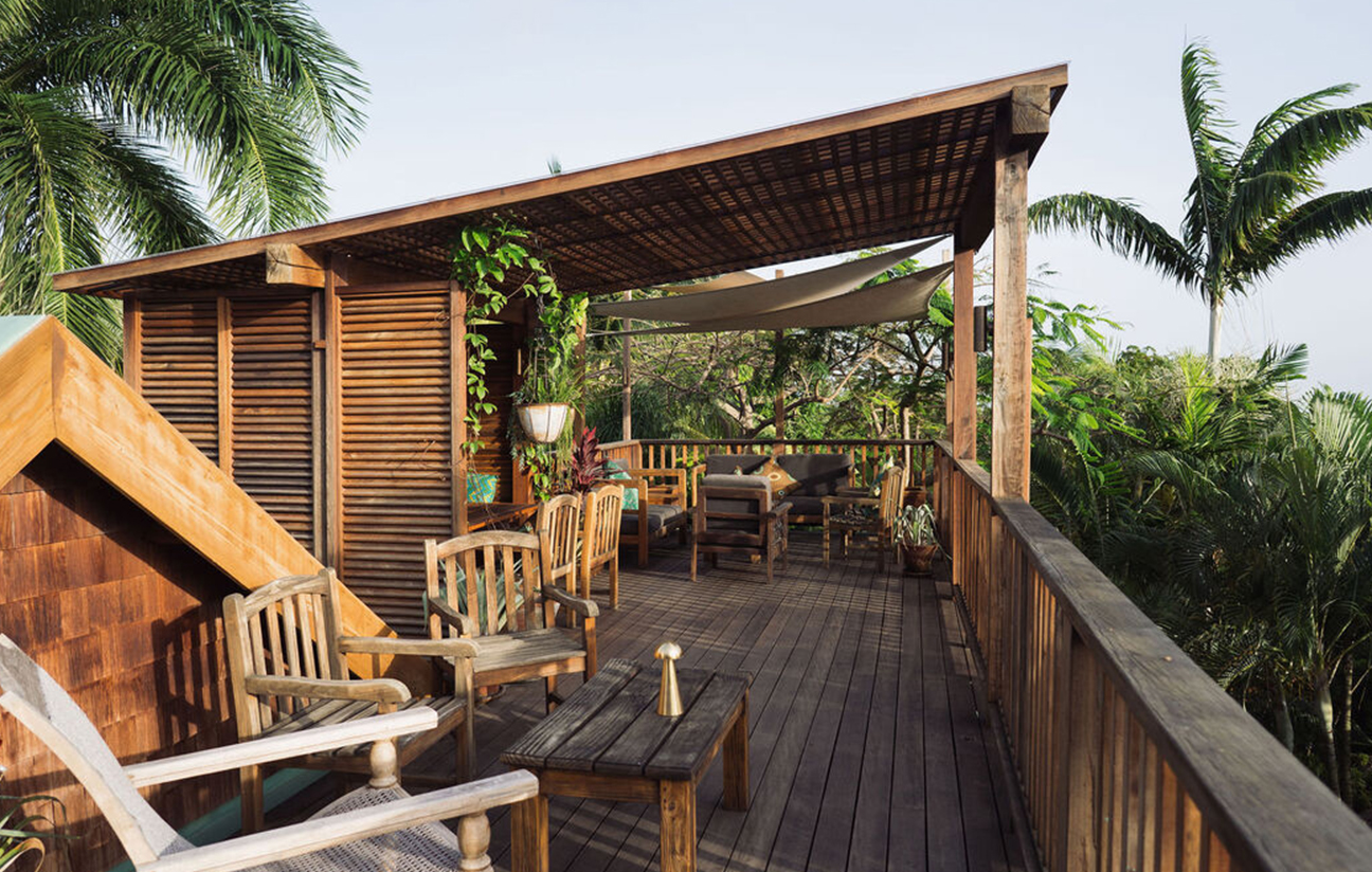 a deck with chairs and tables