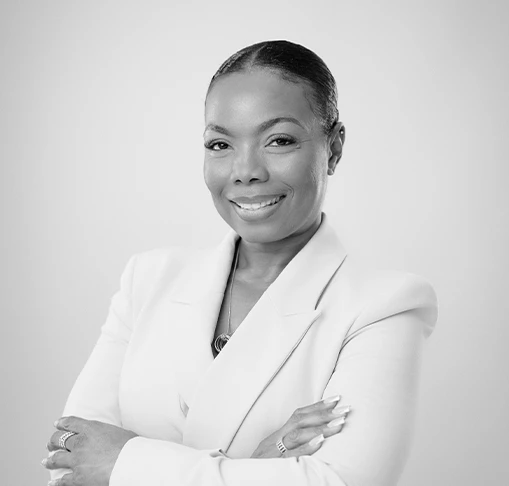 a woman in a white suit