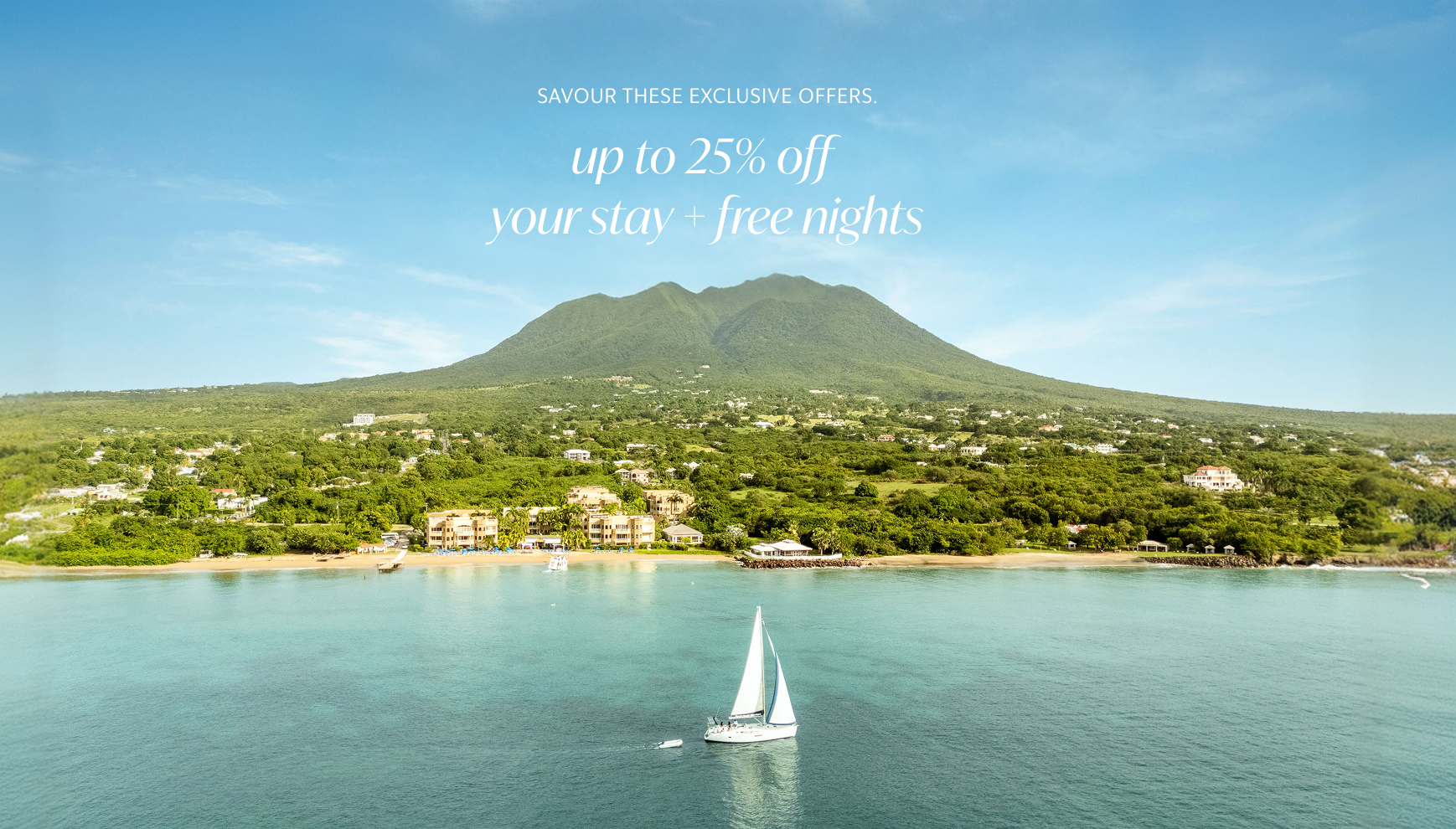a sailboat in the water with a mountain in the background