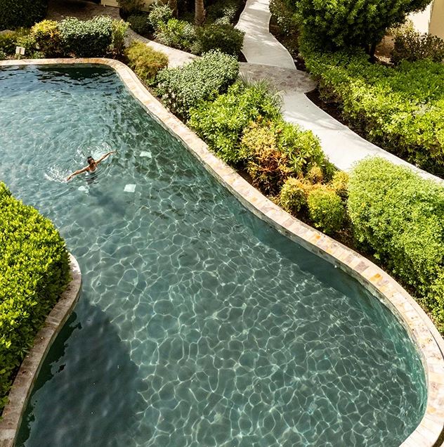 a person swimming in a pool