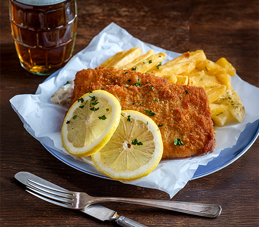 a plate of fried fish and fries