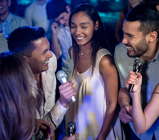 a group of people holding microphones