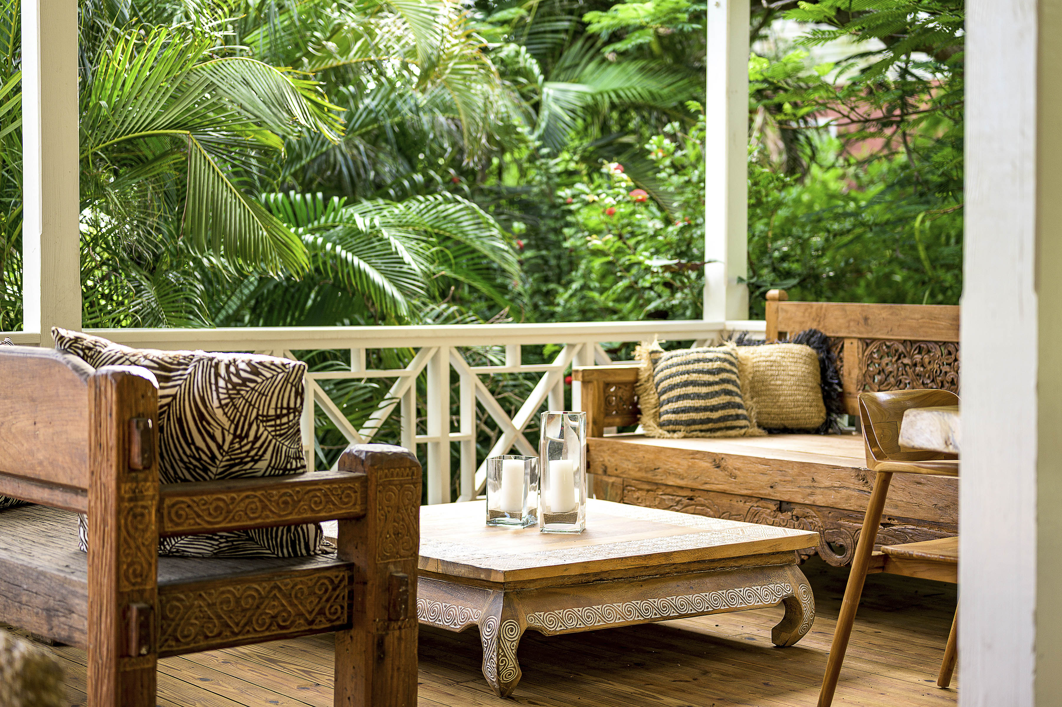 a patio with a table and chairs