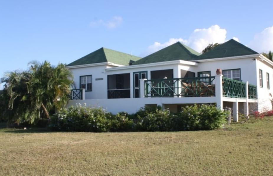 a house with a green roof