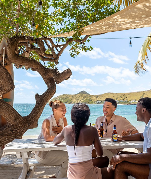 Check out and unplug with the sound of waves crashing against the shore, good company, and a bite or drink.