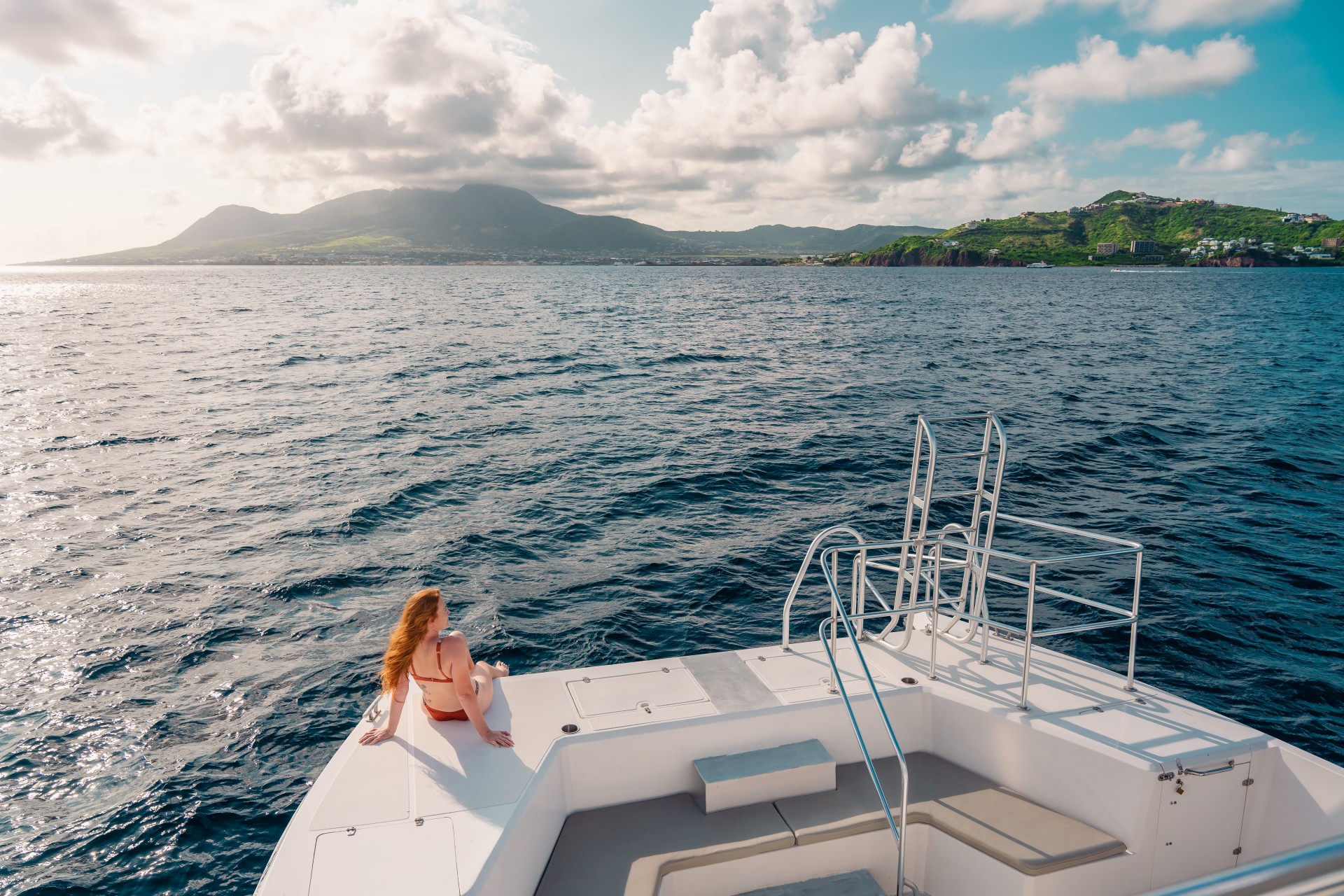a woman sitting on a boat