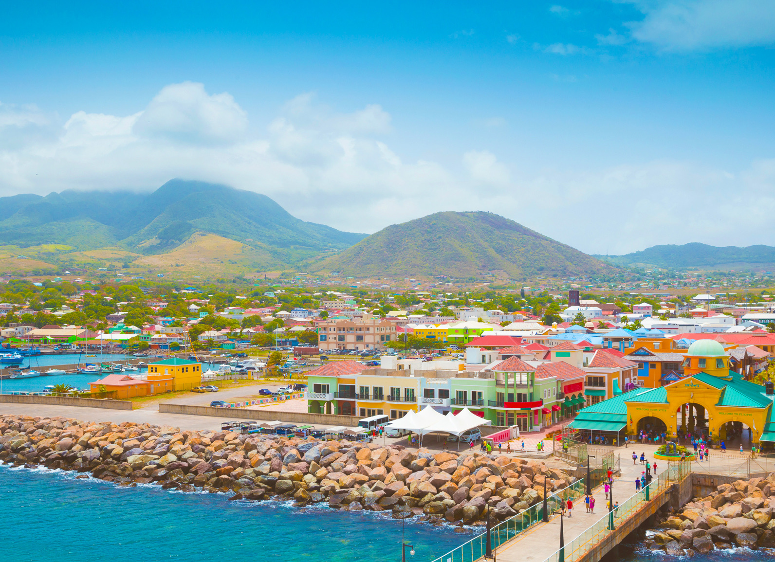 a city with many buildings and tents