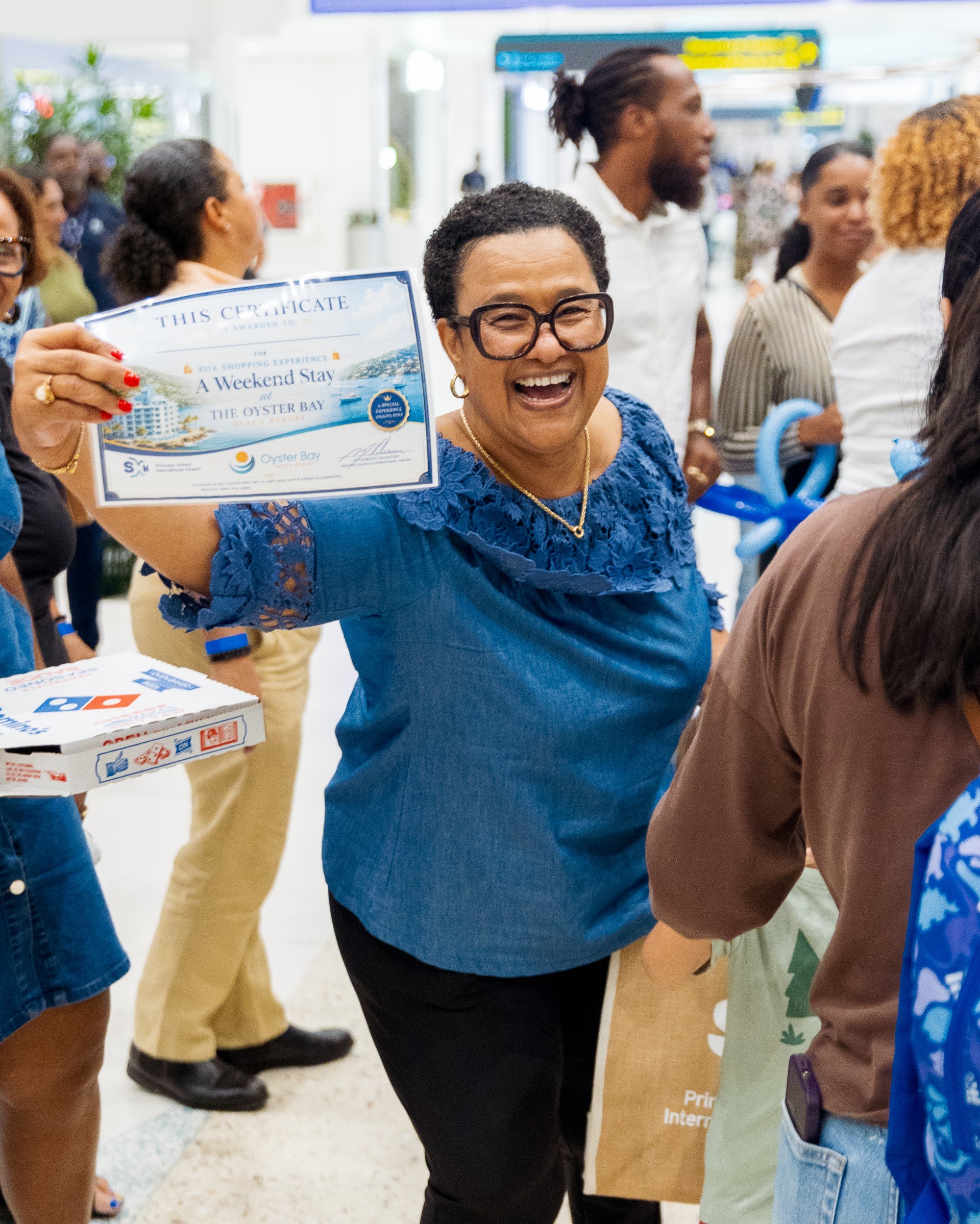 a woman holding a certificate